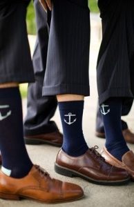 What is a nautical wedding and what are the reasons why you should choose this option - Nautical wedding. Men with socks with anchors