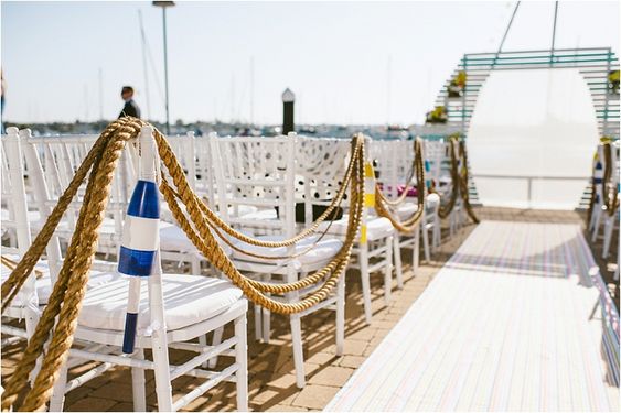 Nautical wedding ideas - necessary elements to comply with the theme - Nautical wedding. Wedding aisle white chairs with ropes