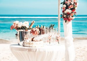 Pink-wedding-theme-–-the-main-tips-and-tricks-that-will-guide-you-to-the-perfect-event_flowers-in-shades-of-pink-along-with-champagne-glasses.