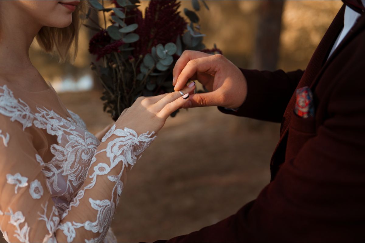 Bridgerton-wedding-bride-dress-burgundy-suit