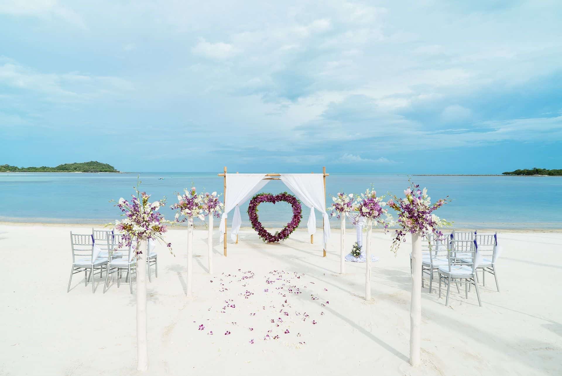 -Wedding-picnic-How-to-organize-a-wonderful-party-white-sand-flowers-beach-wedding-heart.